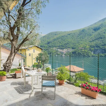 Apartment La Quiete With Private Garden By Rent Laglio